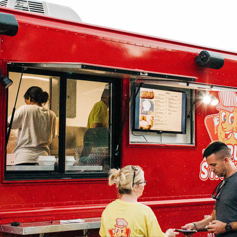 Guests Order Food From Food Truck