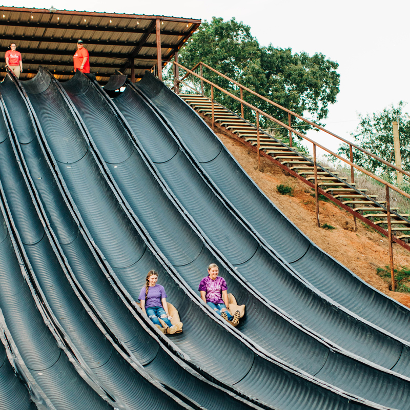 Guests Slide Down Piney Peak Slide