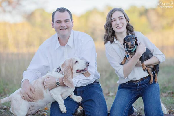 Young Couple With Two Dogs