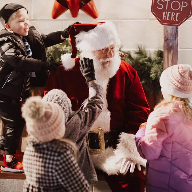 Santa Greets Young Kids